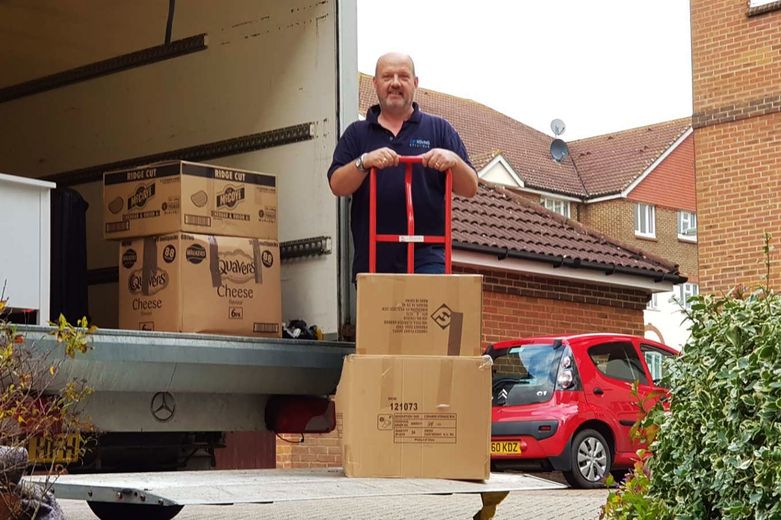 CM Moving Solutions - Boxes being stacked carefully